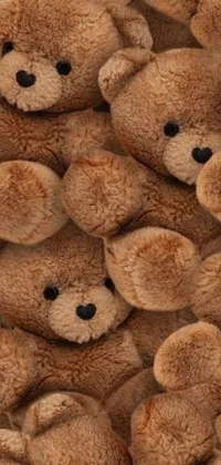 This live phone wallpaper features a playful group of brown teddy bears sitting together, their highly detailed texture enhancing their soft, cuddly appearance