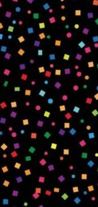 This dynamic phone live wallpaper features colorful confetti sprinkles on a black background from an inspired art style