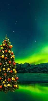 Add some festive flair to your phone with this amazing live wallpaper! A beautifully decorated Christmas tree stands tall in the center of a tranquil lake