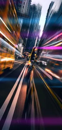 This phone live wallpaper depicts a blurry city street at night with a futuristic motorcycle in the foreground