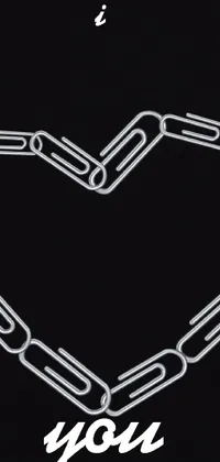 This phone live wallpaper depicts a heart-shaped chain drawing that exudes elegance and passion