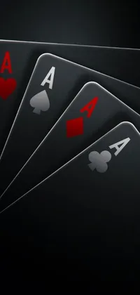 This live wallpaper for your phone showcases a deck of playing cards stacked on top of one another on a dark background