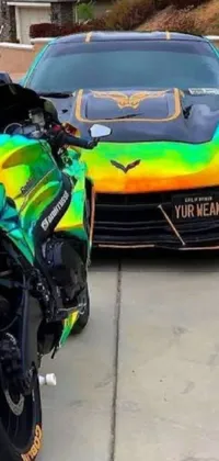 This phone live wallpaper showcases a brightly colored scene with a holographic and metallic green armored car and motorcycle parked in front of a house