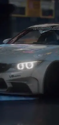 This live wallpaper showcases a stunning white luxury car driving down a dimly lit street at night