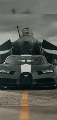 Elevate your phone's home screen with this stunning live wallpaper featuring a Bugatti Chiron parked in front of a fighter jet