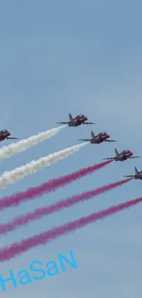 This live wallpaper for phone depicts a group of jets flying in a bright blue sky, accompanied by elegant pink arches at the bottom of the screen