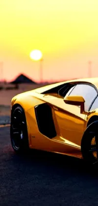 This live wallpaper features a yellow sports car parked in a desert parking lot, with a warm, vibrant and energizing color tone