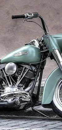 This live wallpaper features a photorealistic, monochromatic airbrush painting of a green Harley Davidson motorbike