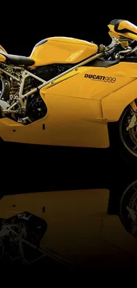 This live wallpaper features a yellow Ducati Panigale Motorcycle parked against a black background, with ultra-high detail and hyperrealism that captures every aspect of the bike including its chrome parts