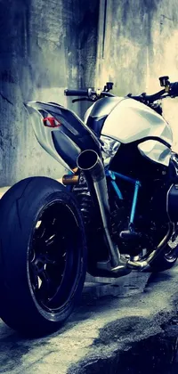 Introducing a mesmerizing phone live wallpaper that features a powerful BMW motorcycle parked on the side of a road