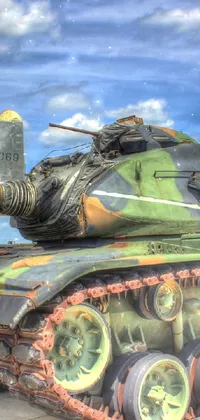 This phone live wallpaper showcases a highly detailed HDR image of a military tank positioned on a runway in Alabama