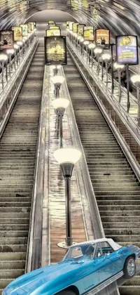 This phone live wallpaper features a blue car resting atop an escalator at a subway station