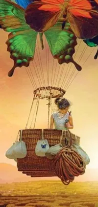 This phone live wallpaper is a surreal and whimsical scene featuring a young girl soaring through the air in a basket surrounded by colorful butterflies