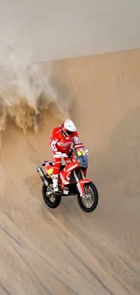 Experience the thrill of motocross with this desert dirt bike live wallpaper! You'll be transported to a stunning red sand landscape where a daring rider tears through the terrain on their bike
