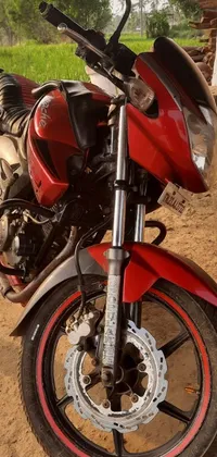Rev up your phone's home screen with our dynamic motorcycle live wallpaper! Featuring a stunning red Samikshavad Pulsar bike parked alongside a dusty dirt road, this wallpaper boasts super precise attention to detail for a realistic and immersive experience