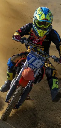 Looking for an exciting phone live wallpaper that's sure to get your heart racing? This stunning image features a dirt bike rider racing around a dirt track in a high-stakes competition
