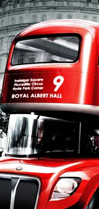 This live wallpaper features a stunning, hyper-realistic image of a red double decker bus on a busy city street