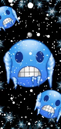 This mobile live wallpaper features a stylish blue skull set against a dark background, surrounded by glittering snowflakes
