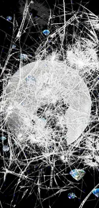 This black and white phone live wallpaper features a broken mirror in abstract expressionist style with intricate lines and splatters
