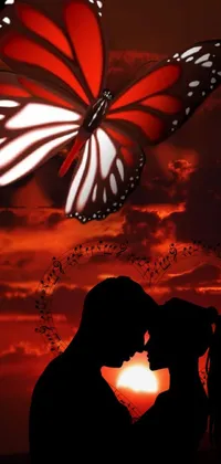 This phone live wallpaper features a stunning red and white butterfly flying over a vibrant sunset filled with red and black hues