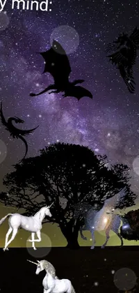 This surrealistic phone live wallpaper showcases magnificent horses grazing in a green field under a star-filled night sky with free-flying bats