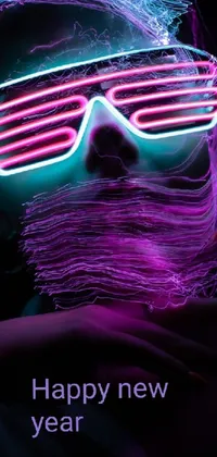 This phone live wallpaper features a man with a beard wearing neon glasses in a vibrant vapor wave style