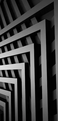 This phone live wallpaper showcases a black and white photo of a room with intricate geometric designs inspired by unsplash's abstract art