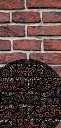 If you're looking for a stunning live wallpaper for your phone, look no further than this black plate and brick wall design
