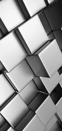 Looking for an effortlessly chic phone wallpaper that will make your iPhone stand out? Check out this black and white live wallpaper featuring an array of cubes in a mesmerizing formation