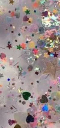 This live wallpaper features a vibrant close-up of a cell phone case adorned with confetti, depicting a screenshot of a conceptual artwork displaying enchanting fairy aesthetics on Instagram