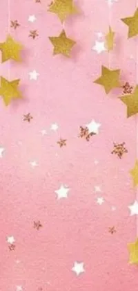 This is a charming live wallpaper for phones featuring a pretty pink wall adorned with shimmering gold stars and intriguing concept art