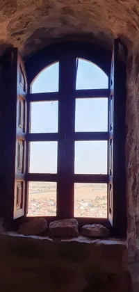 Set your phone background to a mesmerizing view of the Dau-Al-Set Castle in Mardin Old Town, Turkey