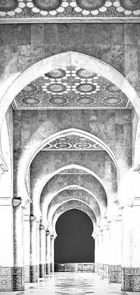 Looking for a simple yet stunning phone live wallpaper? Check out this black and white image of an indoor architectural space with arabesque designs and white stone arches