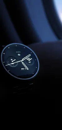 This live wallpaper showcases a sleek digital rendering of a classic watch, set against a mesmerising airplane window view