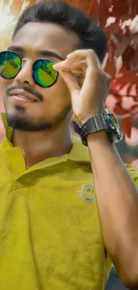 Get the ultimate phone live wallpaper with a stylish man in yellow shirt and green sunglasses