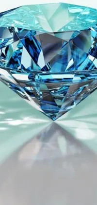 This mesmerizing phone live wallpaper showcases a detailed blue diamond resting on a modern table