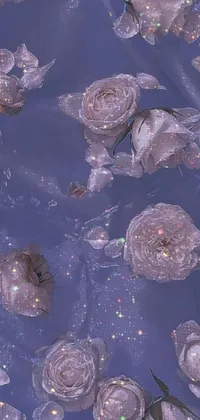 This stunning live wallpaper adds a touch of romanticism to your phone screen, with a cluster of colorful and beautiful flowers gently floating on a reflective body of water, decorated with a scattering of glittering stars that create a serene ambiance