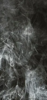 This live wallpaper showcases swirling smoke in black and gray hues inspired by abstract designs