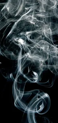 This phone live wallpaper showcases swirling smoke against a black background, with a silhouette of a woman smoking