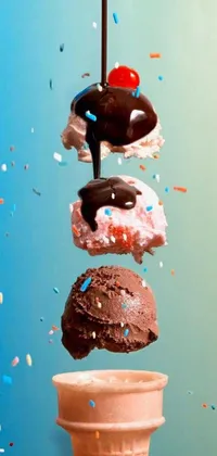 Indulge your cravings with this luscious phone live wallpaper of a cone of ice cream, topped with donuts, sprinkles, and melted chocolate