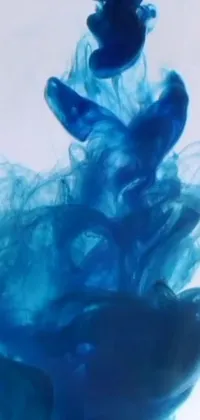 This phone live wallpaper features a mesmerizing blue substance in water