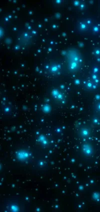 This elegant phone live wallpaper showcases a vivid display of blue stars against a deep black background