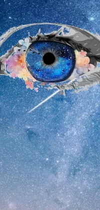 This phone live wallpaper displays a stunning close-up of an eye, blended with a sky background by Lucia Peka using surrealism