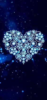 Experience a jaw-dropping digital art with this phone live wallpaper - a heart-shaped diamond artwork against a dreamy blue backdrop