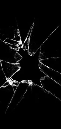 This stunning phone live wallpaper features a realistic broken glass window on a sleek black background