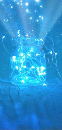 This compelling phone live wallpaper features a jar brimming with glowing lights, framed by a dreamy Tumblr-inspired ethereal background