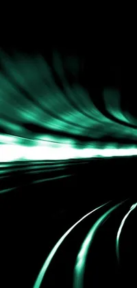 This mobile live wallpaper features a striking image of a train traversing through a tunnel with a blurred effect to create a sense of depth