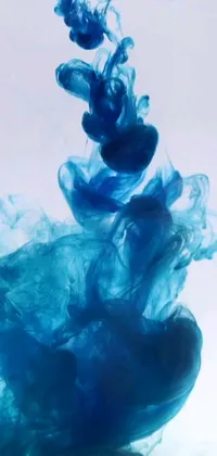 This stunning live wallpaper features a close-up shot of a swirling, undulating blue liquid in water