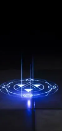 This phone live wallpaper features a captivating and eerie scene with a person standing in the dark, surrounded by a glowing hologram and a mysterious summoning circle