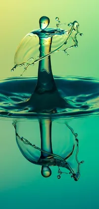 Looking for a stunning phone live wallpaper? Check out this amazing digital art design featuring a water drop falling into a body of water